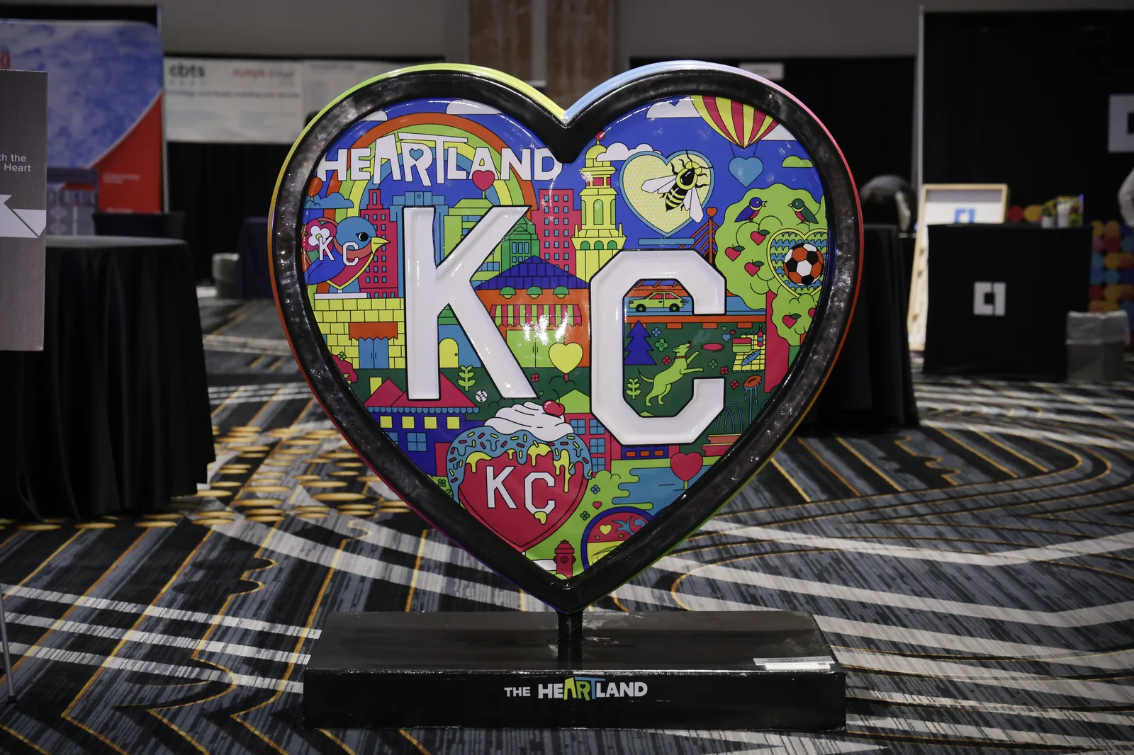 Heartland art display at the IAUG Converge expo hall